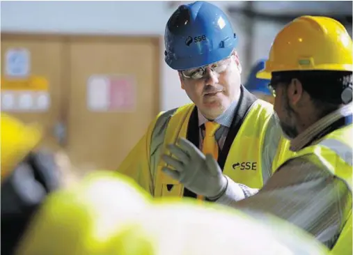  ?? Photograph: Sandy McCook ?? SUPPORT: Scottish Government Minister Paul Wheelhouse visited the SSE Power Station at Foyers yesterday.