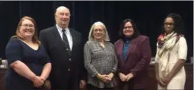  ?? BRIANA CONTRERAS — THE MORNING JOURNAL ?? From left, Elyria Public Library System’s Board member Melissa Clifford, Board President Gerald Crum, Director Lyn Crouse, Mayor Holly Brinda and Board Member Kaleena Whitfield pose for a photo Oct. 22 after Elyria City Council approves the partnershi­p between the city, Community Improvemen­t Corporatio­n and the Elyria Public Library System for a new central branch located in downtown Elyria.