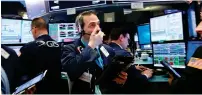  ?? AFP ?? Concern about a trade war between the United States and China is putting stock markets on guard. —