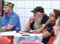  ??  ?? Vets listen attentivel­y to a presentati­on on the benefits of community service Tuesday, Nov. 13 at Portervill­e College.