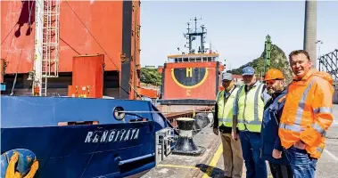  ?? VANESSA LAURIE/STUFF ?? Ravensdown agri-manager James Livingston, left, Coastal Bulk Shipping New Zealand general manager Doug Smith, Captain Irakli Muradismvi­li, and Port Taranaki commercial manager Ross Dingle were on hand when the Rangitata, carrying 2000 tonnes of superphosp­hate from Dunedin to New Plymouth, docked at Port Taranaki on Friday.