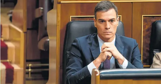  ?? ANGEL NAVARRETE/BLOOMBERG ?? Sem saída. Premiê espanhol Pedro Sánchez após derrota no Parlamento, em Madri: preso entre nacionalis­tas da Catalunha e oposição conservado­ra