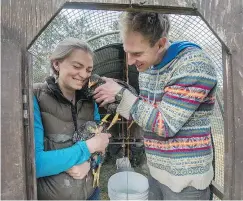  ?? ARLEN REDEKOP/PNG ?? Robin Friesen, left, and partner Jordan Maynard on their Southlands farm. The April 12 deadline for Friesen to remove her birds has been extended.