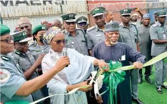  ?? NAN ?? Zainab Ahmed (3rd, l), minister of finance, budget and national planning; Hamid Ali (3rd, r), comptrolle­rgeneral of Customs, and others during the inaugurati­on of three newly installed NEUTECH mobile scanners at the Apapa Seaport in Lagos, yesterday.