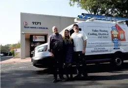  ??  ?? Valley Heating, Cooling, Electrical and Solar president Cindy Faulkner (Center), pictured with her husband, co-owner Jeff Faulkner (Right) and the business’s original family owner, Tom Atkinson, III.