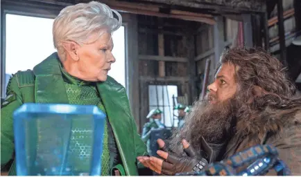  ??  ?? Judy Dench is elf Commander Root and Josh Gad is Mulch Diggums in “Artemis Fowl.”