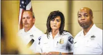  ??  ?? MARIA ALEJANDRA CARDONA — MINNESOTA PUBLIC RADIO VIA AP Minneapoli­s police chief Janee Harteau, center, stands with police inspector Michael Kjos, left, and assistant chief Medaria Arradondo during a news conference recently in Minneapoli­s. People who...