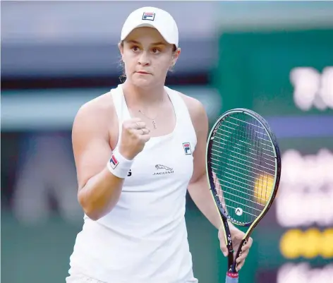  ?? — Reuters ?? Australia’s Ashleigh Barty celebrates at Wimbledon.