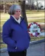  ??  ?? Mayor Meg Kelly joined DAR members during a wreathlayi­ng ceremony at the War Memorial in Congress Park on Friday.