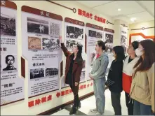 ?? SHI XIAOBO / FOR CHINA DAILY ZHANG QIAN / FOR CHINA DAILY ?? From left: Calligraph­ers in Taiyuan express their best wishes for the 100th anniversar­y of the founding of the Communist Party of China. University students in the city of Jinzhong visit an exhibition on the Party’s history.