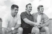  ?? AP FILE PHOTO ?? Dolphins coach Don Shula poses with quarterbac­ks Earl Morrall, left, and Bob Griese on Jan. 3, 1973. Morrall stepped in for injured Griese in the fifth game.