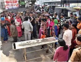  ??  ?? A view of civil hospital gate where a pregnant woman delivered a baby after the hospital staff refused to admit her for not having an Aadhaar card, in Gurgaon on Friday. — PTI