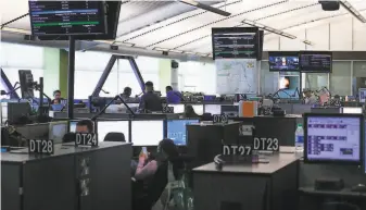  ?? Michael Macor / The Chronicle 2017 ?? Getting emergency assistance after calling the San Francisco 911 call center could take longer if cuts are still needed, because it would affect the overtime budget.