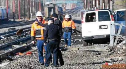  ?? DIGITAL FIRST MEDIA FILE PHOTO ?? Officials at the location of the fatal Amtrak accident in Chester on April 3, 2016.