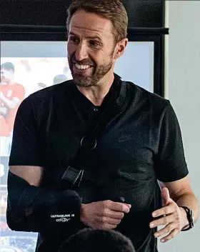  ??  ?? No ’arm done: Gareth Southgate sporting a sling after his injury