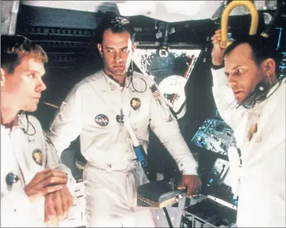  ??  ?? Kevin Bacon, Tom Hanks and Bill Paxton as astronauts Jack Swigert, Jim Lovell and Fred Haise in the movie Apollo 13