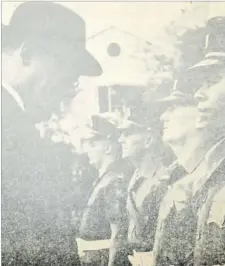  ?? Picture: FILE ?? Sir David Trench (left) inspects a guard of honour in Hong Kong.