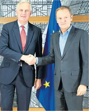  ??  ?? Hand in hand: Michel Barnier, left, and Donald Tusk are stitching up Britain