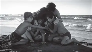  ?? Carlos Somonte/Netflix ?? One of the many moving sequences with Cleo and the family she cares for in “Roma” takes place on a beach.