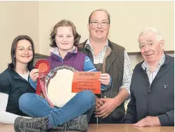  ?? Picture: Ron Stephen. ?? Lawrie & Symington hosted the second show and sale of autumn-born calves. The best pen of four calves was shown by R Simpson and Son, Mains of Creuchies. Ruby Simpson with the F&F Farquharso­n Silver Salver and, from left, Fiona Lawson of Lawrie &...