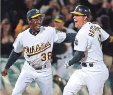  ?? 2002 PHOTO BY BEN MARGOT, AP ?? Scott Hatteberg hit the homer that capped the A’s record win.