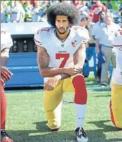 ?? AP ?? San Francisco 49ers' Colin Kaepernick kneels during the US national anthem before an NFL game.