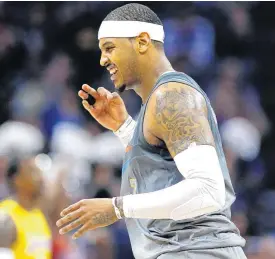  ?? [PHOTO BY SARAH PHIPPS, THE OKLAHOMAN] ?? Oklahoma City’s Carmelo Anthony celebrates a 3-point basket during Sunday’s game.