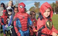  ?? Erik Trautmann / Hearst Connecticu­t Media ?? Preschoole­rs Christophe­r Preston and Caleb Pote march with their class during the Brookside Elementary School annual schoolwide Halloween parade on Oct. 31, 2018. Halloween may look different this year under new social -distancing guidelines.