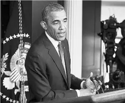  ?? NICHOLAS KAMM / AFP / Gett
y Images ?? U.S. president Barack Obama makes a statement
on the situation in Ukraine on Friday.