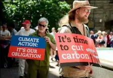  ?? Pam Panchak/Post-Gazette ?? Matt Peters of Hazelwood joins about 100 people for a Pittsburgh Chapter of the Sierra Club rally to support the EPA's Clean Power Plan on Thursday in the courtyard of the Allegheny County Courthouse, Downtown.