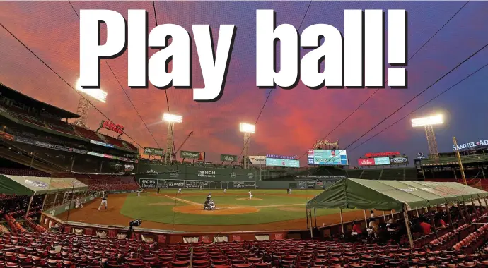  ?? MATT sTonE / hErAld sTAff filE ?? SIGHT FOR SORE EYES: A sunset is seen during the ninth inning of the Red Sox game against the Tampa Bay Rays at Fenway Park on Aug. 13, 2020. The Sox host the Orioles on Opening Day this afternoon.