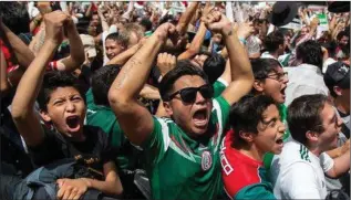  ??  ?? Mexican fans’ faces bursting with joy as their team beat Germany.