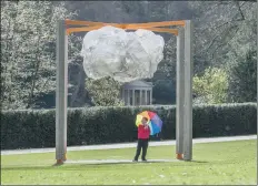  ?? PICTURES: JAMES HARDISTY. ?? ARTWORKS: Clockwise from left, Charles Holland’s giant parrot is part of the Folly! trail; The Raining Cloud was designed by 11-year-old Foster Carter; Thomas Hillier and Pascal Bronner of Fleafolly with the bath house listening tower.