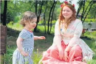  ??  ?? Flower girls Miss Lilias Beth Caldow and a little friend