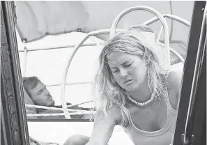  ??  ?? Richard Sharp (Sam Claflin) is injured and does not help Tami Oldham (Shailene Woodley) in “Adrift.” KIRSTY GRIFFIN/STX FILMS