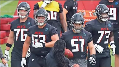  ?? AP-Curtis Compton, File ?? Atlanta Falcons offensive lineman tackle Kaleb McGary, from left, guard Chris Lindstrom , center Alex Mack, and tackle Matt Gono take the line during an NFL football training camp practice Saturday, Aug. 15, 2020, in Flowery Branch, Ga.