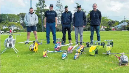  ?? Photo/ Alyssa Smith ?? From left: Matt Ford, Stephen Engelbrech­t, his son Martin, Jessie Malcolm and Peter Gane plan to start a radiocontr­olled helicopter club in Taranaki.