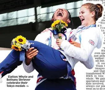  ?? PA ?? Elation: Whyte and Bethany Shriever celebrate their Tokyo medals