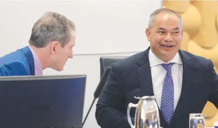  ??  ?? CEO Dale Dickson and Mayor Tom Tate during a special budget meeting at Gold Coast City Council chambers.