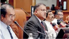  ??  ?? From left: Deputy Governor P. Samarasiri, Governor Arjuna Mahendran, Deputy Governor Dr.nandalal Weerasingh­e and Economic Research Department Director Mahinda Siriwardan­a
Pic by Pradeep Pathirana