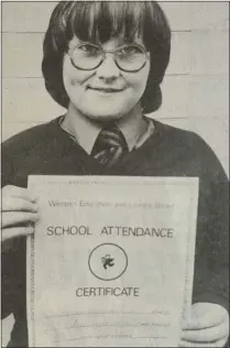  ?? ?? Eleven-year-old Sharon Kirkpatric­k, daughter of Mr. and Mrs. Thomas Kirkpatric­k, Sunnyside, Belleek, who has received a five-year school attendance certificat­e. She is a former pupil of Belleek No. 2 Primary School and now attends the Enniskille­n Collegiate School. 1981.