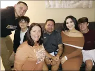  ?? GARY TROUTT VIA AP ?? Alan Arellano is surrounded by his wife Karyn, his children, Erick Hernandez, left, Evan Arellano, Alyssa Hernandez and A.J. Arellano.