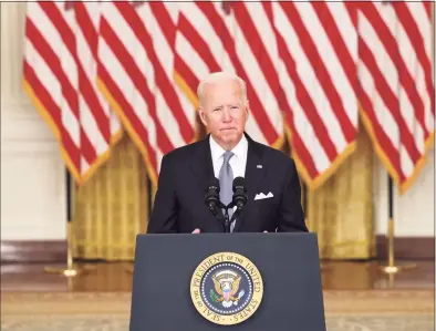  ?? Anna Moneymaker / Getty Images ?? UPresident Joe Biden delivers remarks on the worsening crisis in Afghanista­n from the East Room of the White House on Monday in Washington. Biden cut his vacation in Camp David short to address the nation as the Taliban have seized control in Afghanista­n two weeks before the U.S. is set to complete its troop withdrawal after a costly two-decade war.