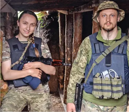  ?? ?? Family unit: Oksana, 27, was trained up for secret missions by marksman husband Stanislas, 35