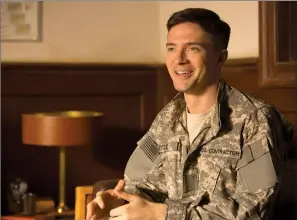  ?? THE CANADIAN PRESS/ AP-FRANCOIS DUHAMEL/NETFLIX VIA AP ?? This image released by Netflix shows Topher Grace in a scene from "War Machine." Grace stars opposite Brad Pitt in the streaming service's original new military satire "War Machine," which hits Netflix in Canada on Friday.