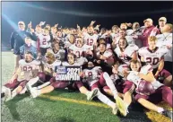  ?? Pete Paguaga / Hearst Connecticu­t Media ?? Killingly celebrates its Class M championsh­ip victory over Rockville on Saturday.