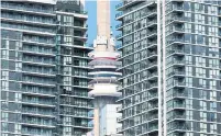  ?? RICHARD LAUTENS TORONTO STAR FILE PHOTO ?? A new report warns that as personal debt levels remain high, more Canadian households may find themselves “vulnerable.”