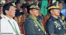  ??  ?? KRIZJOHN ROSALES President Duterte sits with new Army chief Maj. Gen. Rolando Bautista during a change of command ceremony at Fort Bonifacio in Taguig yesterday. At right is Armed Forces chief Gen. Eduardo Año.
