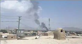  ?? AFP ?? Smoke rising into the air after Taliban militants launched an attack on Ghazni on Friday.