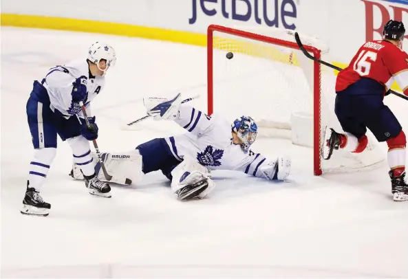  ?? BRYNN ANDERSON/AP ?? Florida centre Aleksander Barkov beats Toronto Maple Leafs goaltender Frederik Andersen in the Panthers’ 4-3 overtime victory Saturday in Sunrise, Fla.